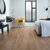 Luxury vinyl wood flooring in a bedroom inside an apartment