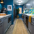 Grey Oiled Oak adds modern charm to a kitchen remake for a pregnant veteran and her fiancée.