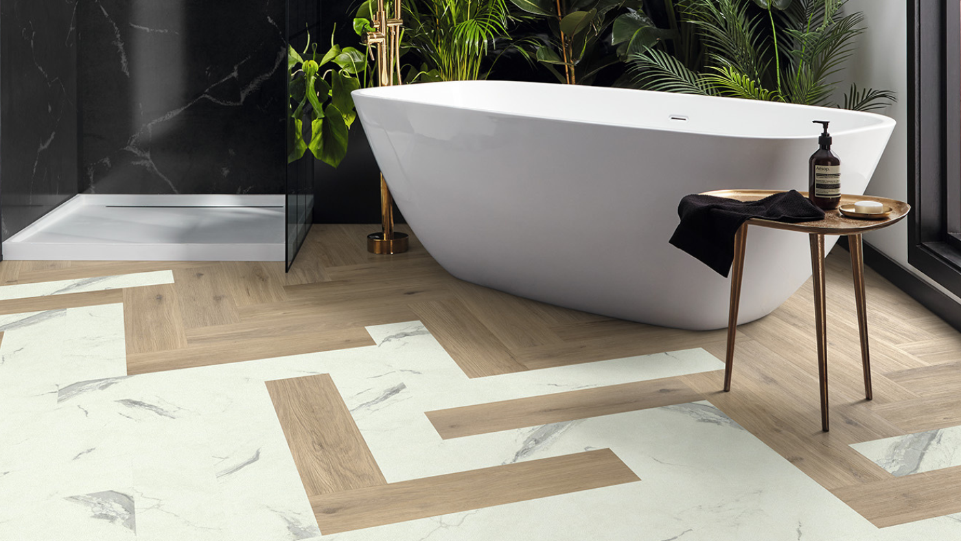 Karndean herringbone mix of wood and stone flooring in a bathroom