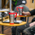 A fitter visiting the Karndean Training Academy sat on a chair