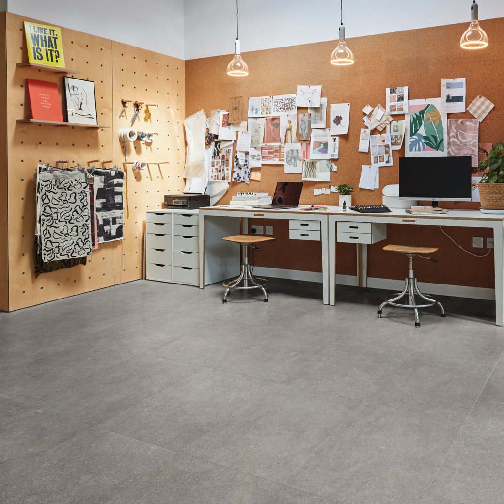 Art Select Cambric Stone dark grey LVT flooring in a working type environment