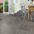 Corris dark grey LVT flooring laid in a dining room