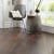 Photo of KP98 Aged Oak dark brown LVT flooring in a home by a window