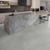 Large marble waterfall island in a kitchen with Ontario LLT218 floors