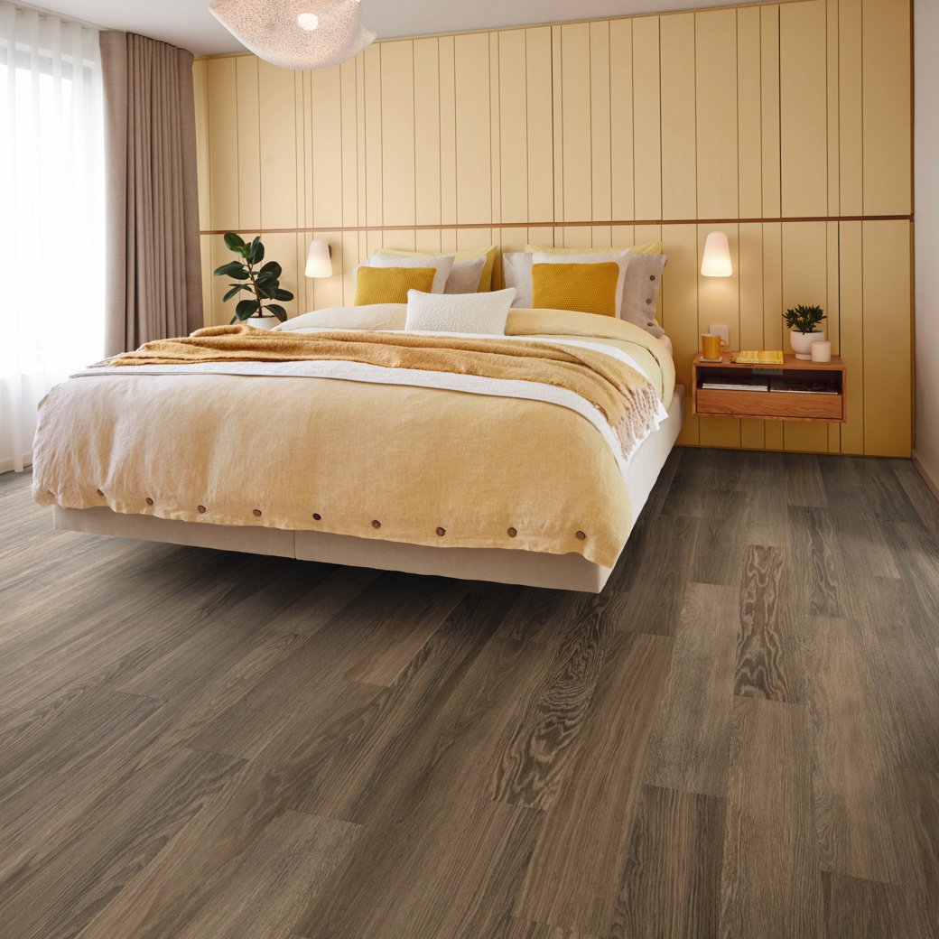 Cocoa limed oak dark brown lvt flooring laid in a bedroom