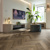 Cocoa limed oak herringbone brown LVT flooring in a living room