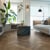 Cocoa limed oak herringbone flooring laid in a living room