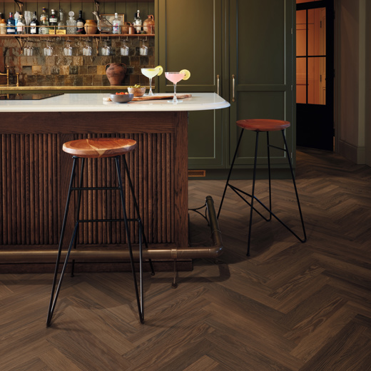 Nutmeg limed oak dark brown herringbone flooring in a kitchen